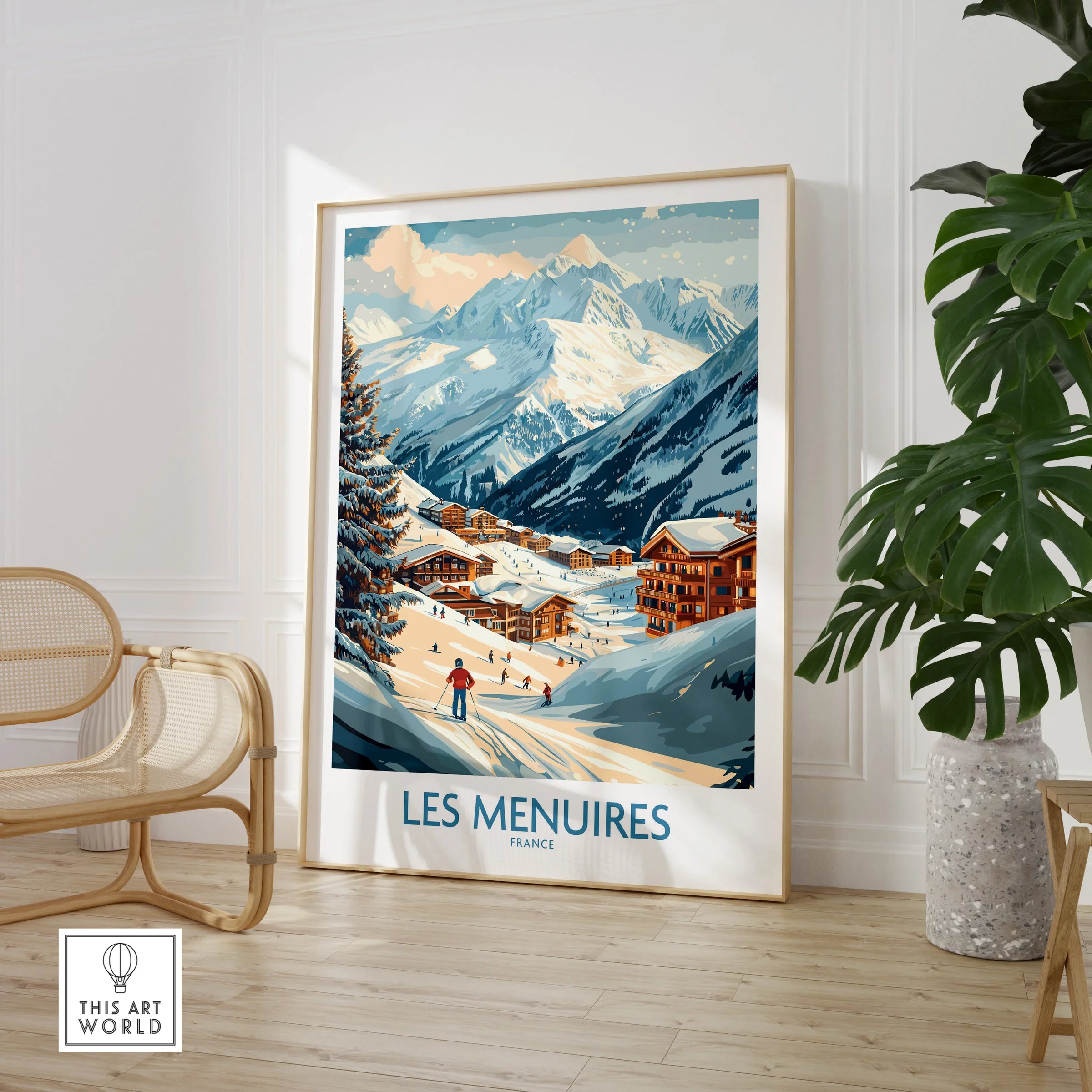 Framed Les Menuires France ski resort travel poster in modern room with chair and plant