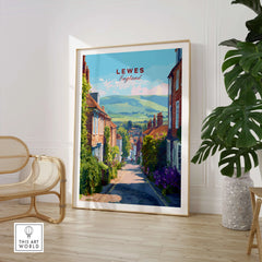 Lewes England travel poster print in frame, styled in modern home with plant and chair