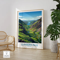 Framed Llanberis Pass Snowdonia landscape print in modern room with chair and plant