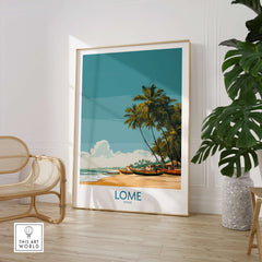 Lomé Togo Canvas Print | Tropical Coastal Village Scene Posters displayed in a modern interior with palm trees and beach.