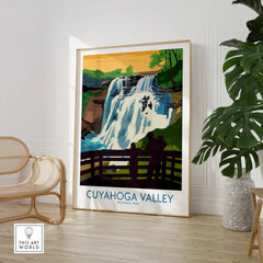 Cuyahoga Valley National Park waterfall print framed in modern living room with chair and plant.
