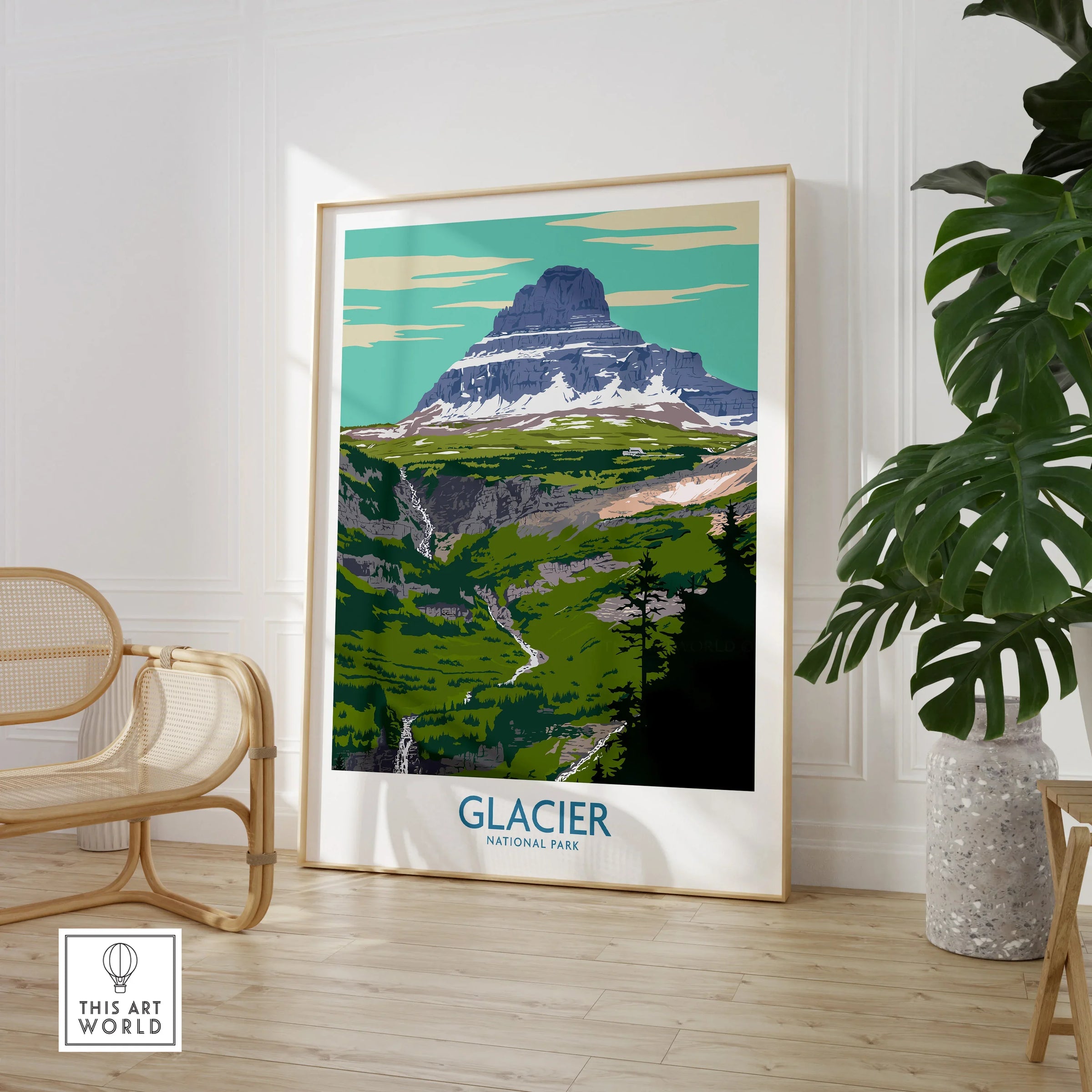 Glacier National Park framed wall art in modern living room with chair and green plant