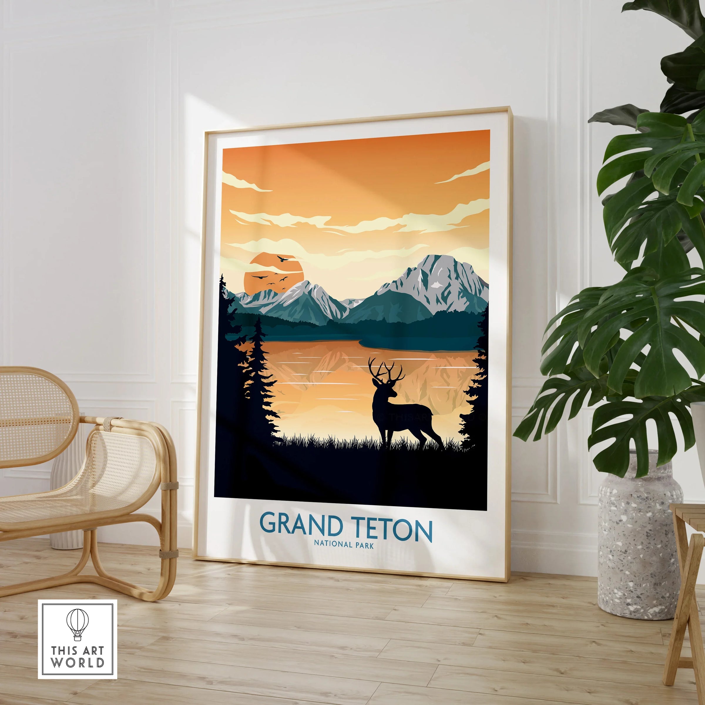 Framed Grand Teton National Park print with deer silhouette in modern living room decor