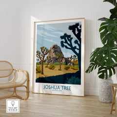 Framed Joshua Tree National Park travel poster in modern room with chair and green plant.