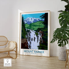 Framed Mount Rainier National Park wall art with waterfall in modern room, near chair and plant.