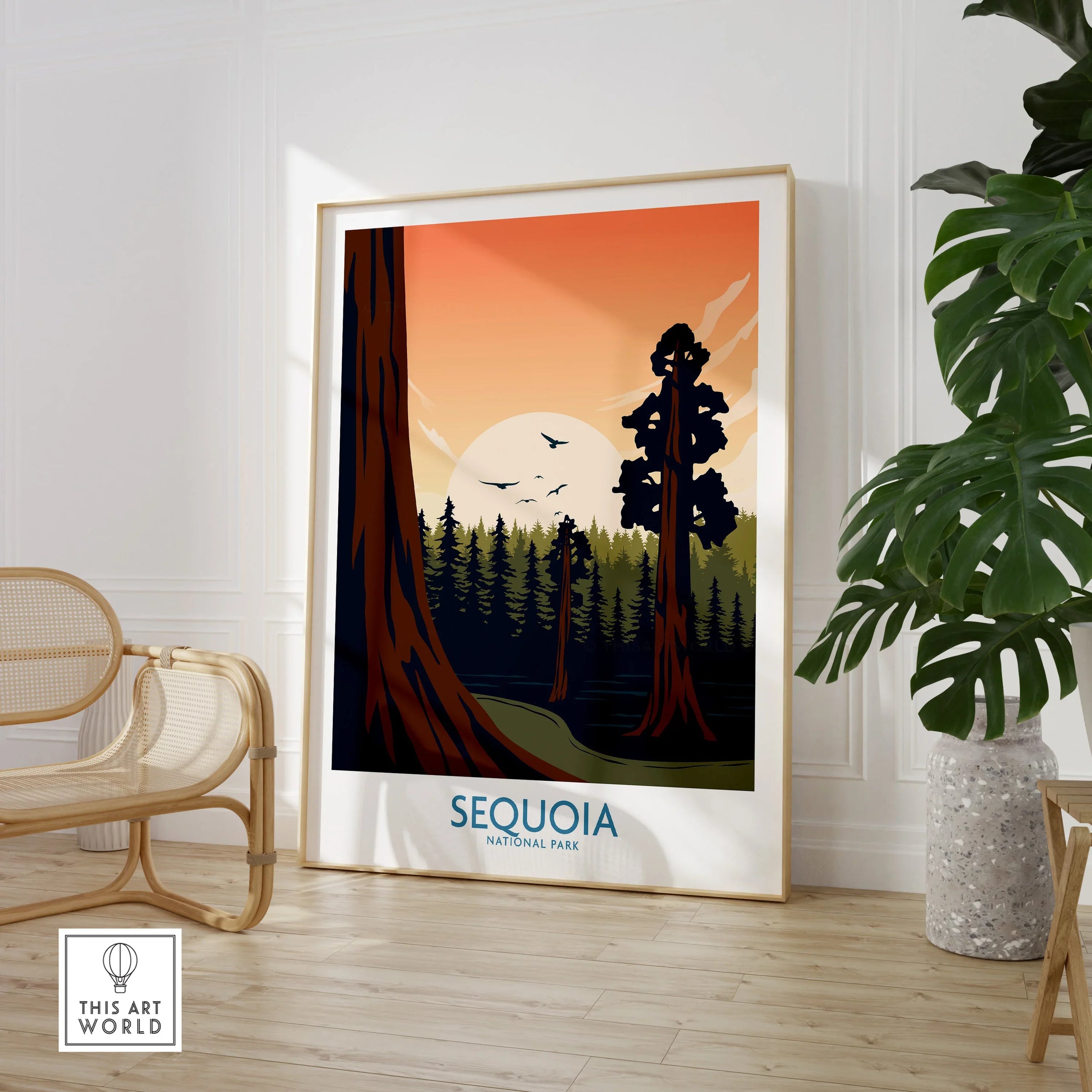 Framed Sequoia National Park wall art print in a modern room with rattan chair and plant