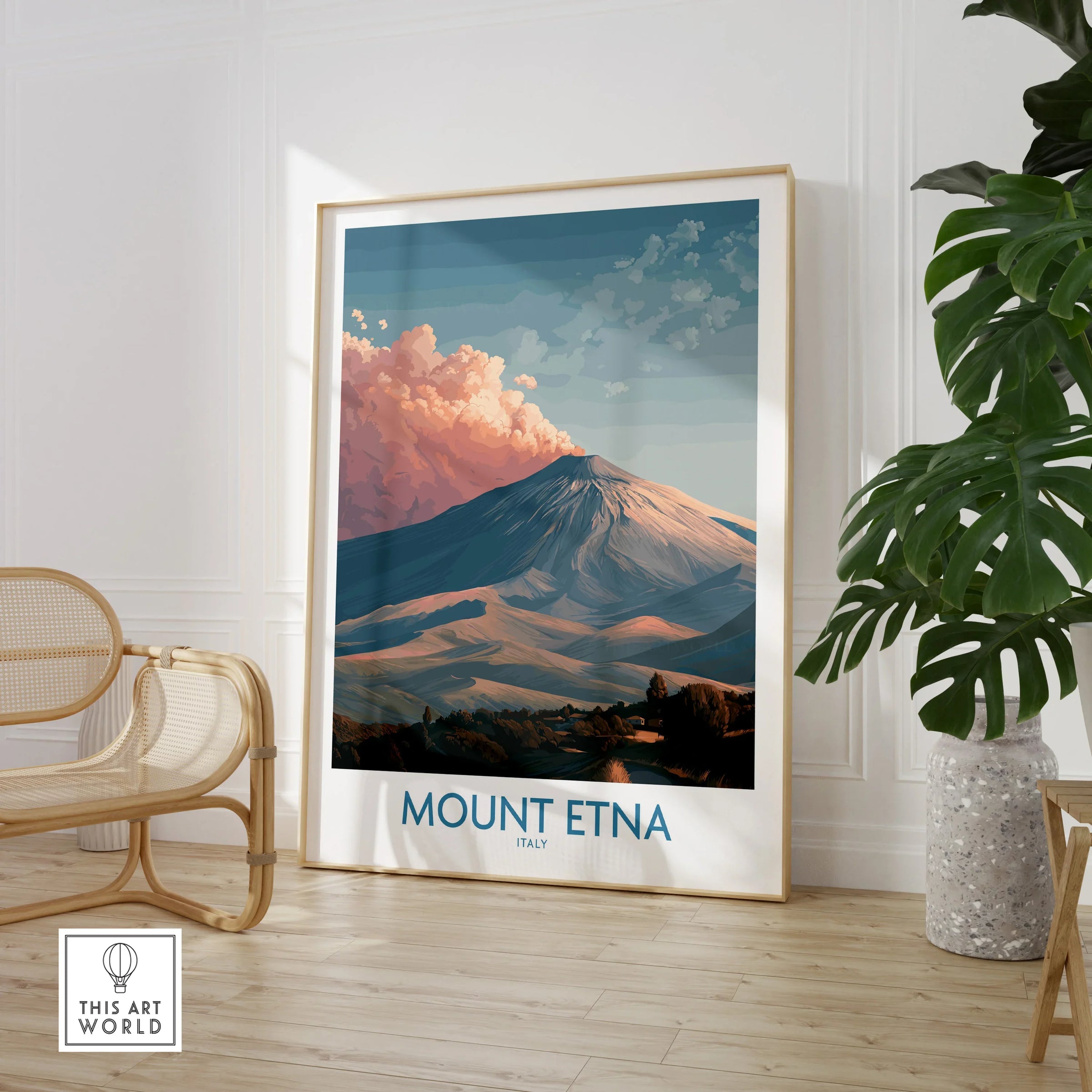 Mount Etna travel poster framed on wall in modern living room with chair and plant