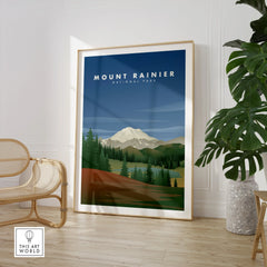 Framed Mount Rainier National Park print in modern room with chair and plant
