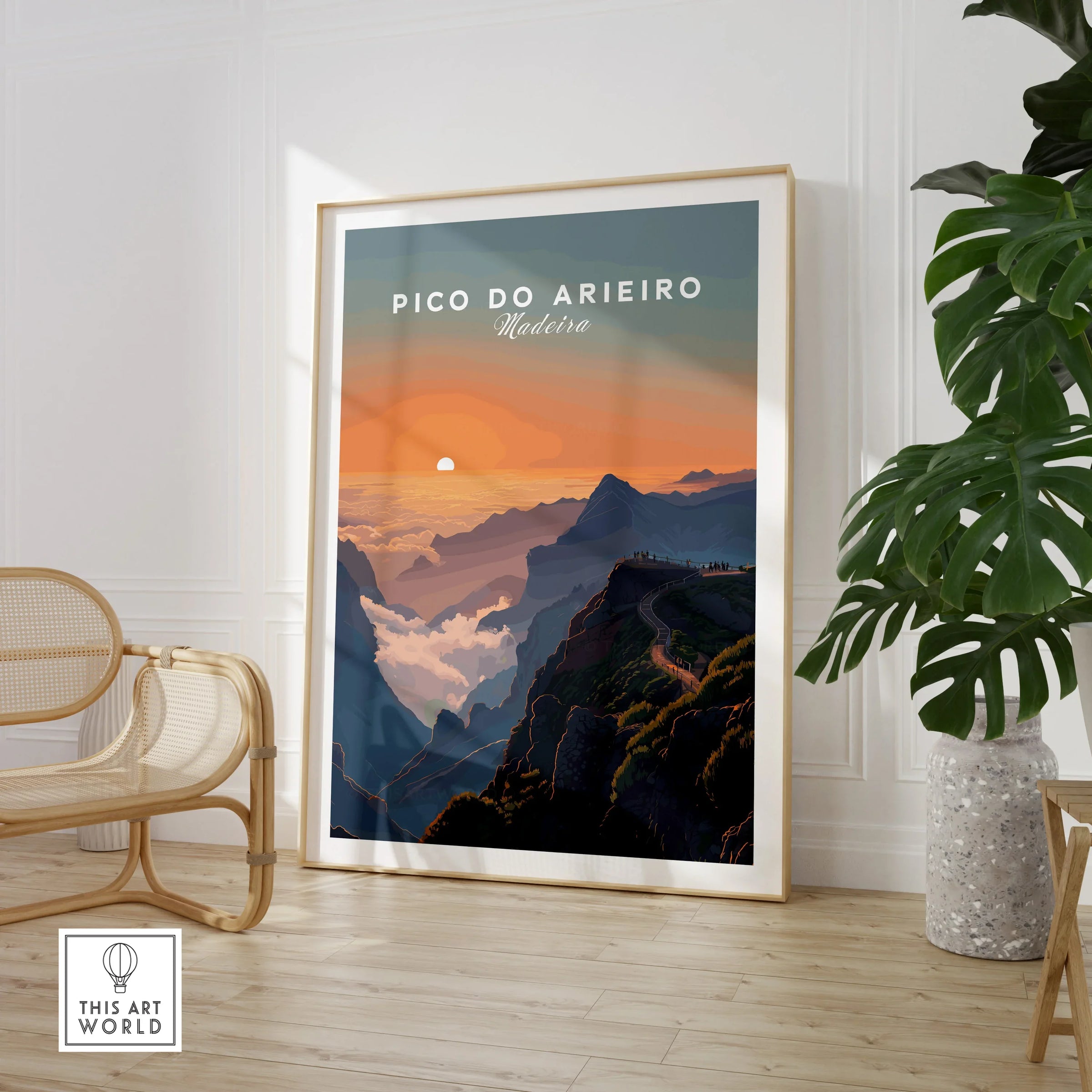 Framed Pico do Arieiro Madeira travel poster in modern room with chair and plant