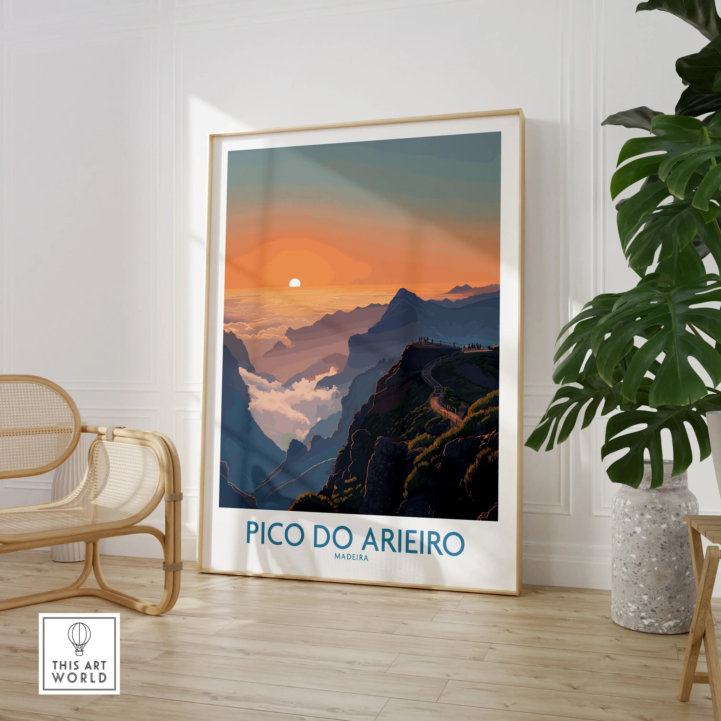 Framed Pico do Arieiro travel print in modern room with chair and plant