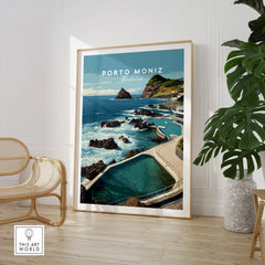 Porto Moniz Madeira travel poster framed, coastal wall art in modern room with chair and plant