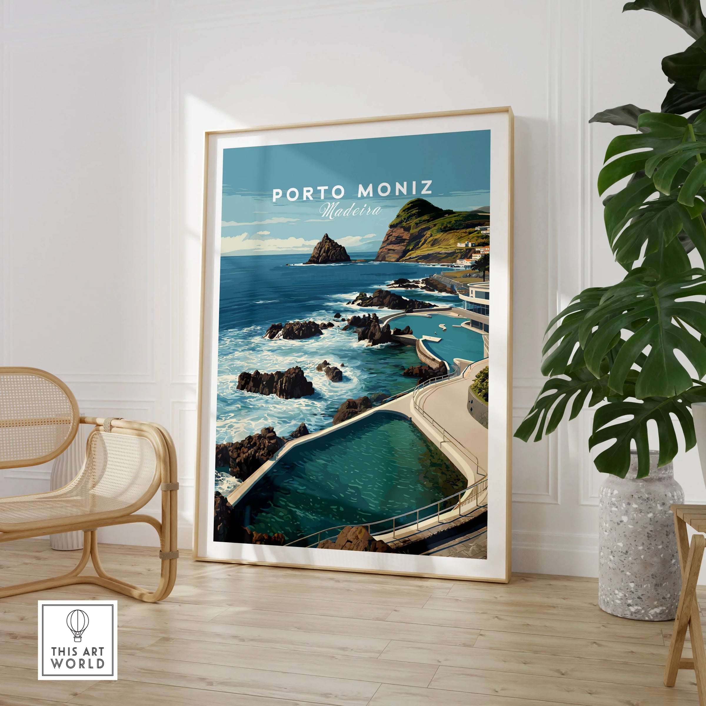Porto Moniz Madeira travel poster framed, coastal wall art in modern room with chair and plant