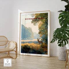Richmond Park travel poster print with a stag, displayed in a modern room with chair and plant