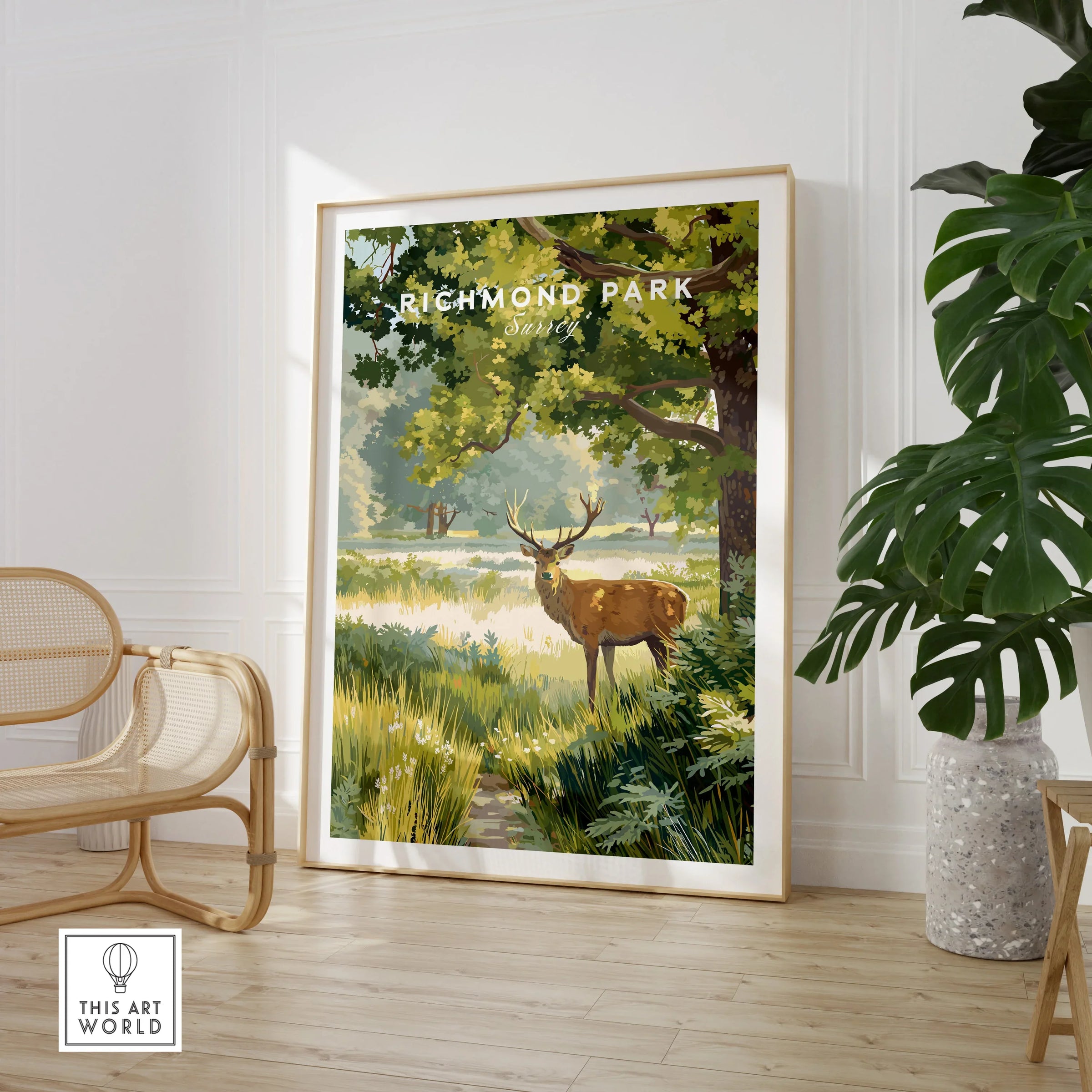 Richmond Park wall art print with deer, displayed in modern room with chair and plant
