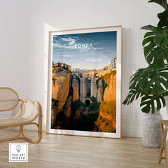 Ronda Spain Wall Art Print | Historic White Village Cliffside Travel Poster displayed in a modern living room.