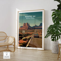Framed Route 66 travel poster with desert landscape in modern room decor setting