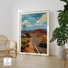 Route 66 travel poster print with vintage car in desert landscape, framed wall art in modern room
