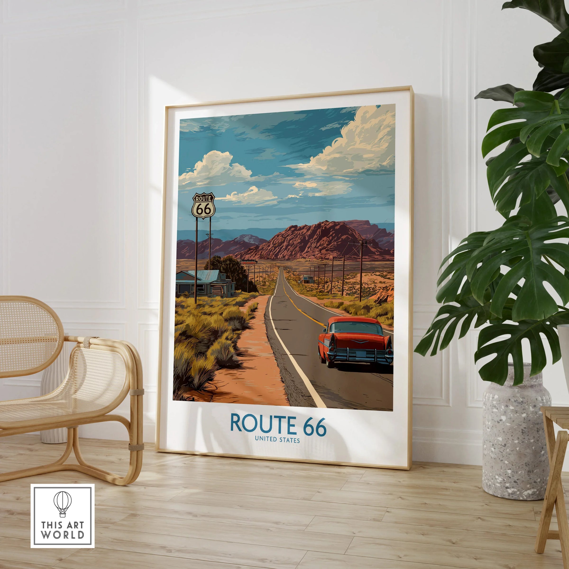 Framed Route 66 travel poster with classic car, desert landscape, and mountains, styled in modern room