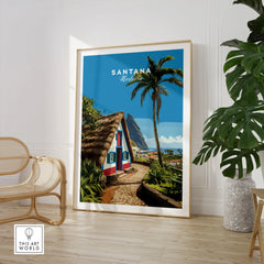 Santana Madeira travel poster with thatched house, palm, and ocean, framed in modern room