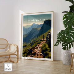 Scafell Pike Lake District Travel Poster | Mountain Valley View Wall Art Print displayed in a modern interior with a plant.