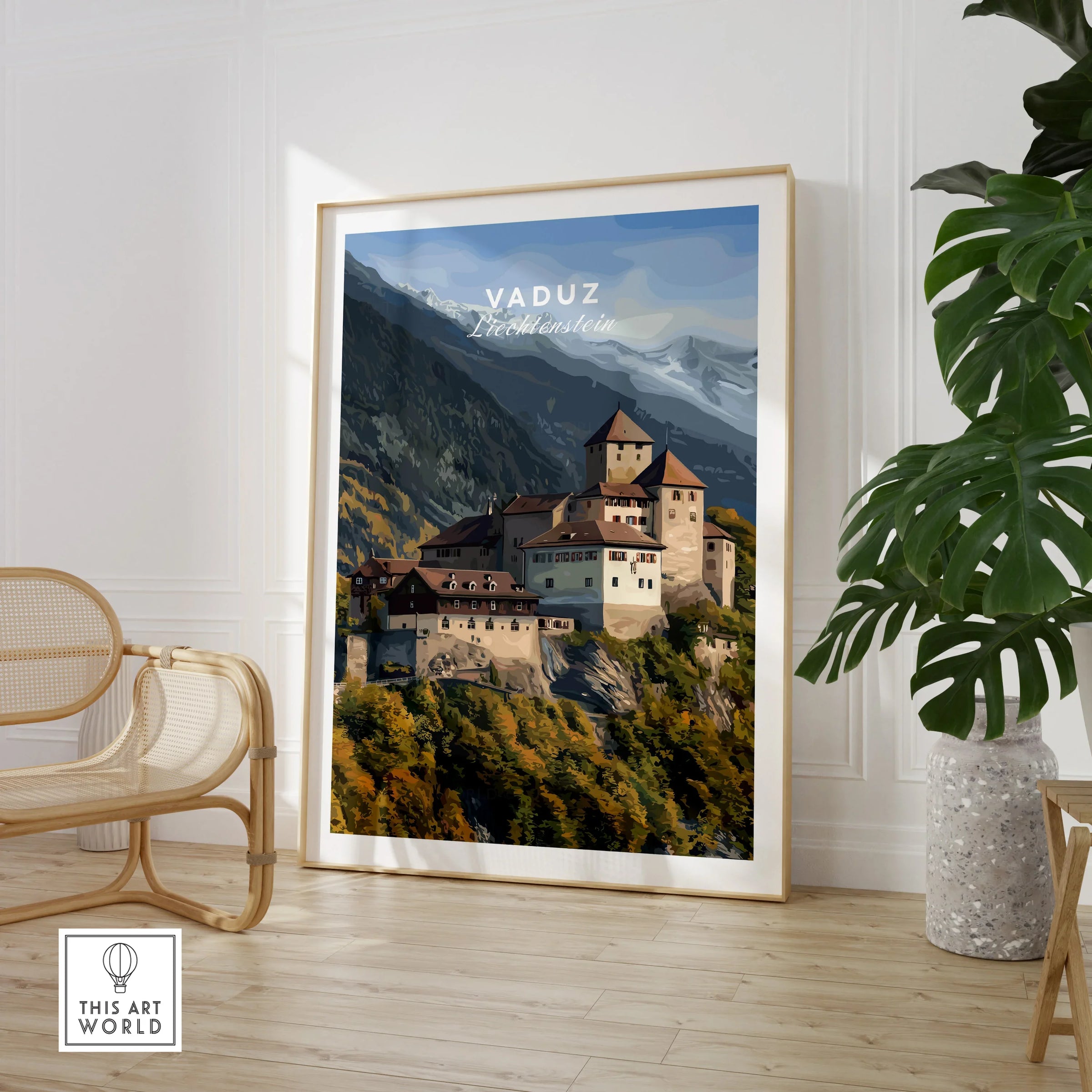 Framed Vaduz Liechtenstein travel poster in modern room with chair and plant