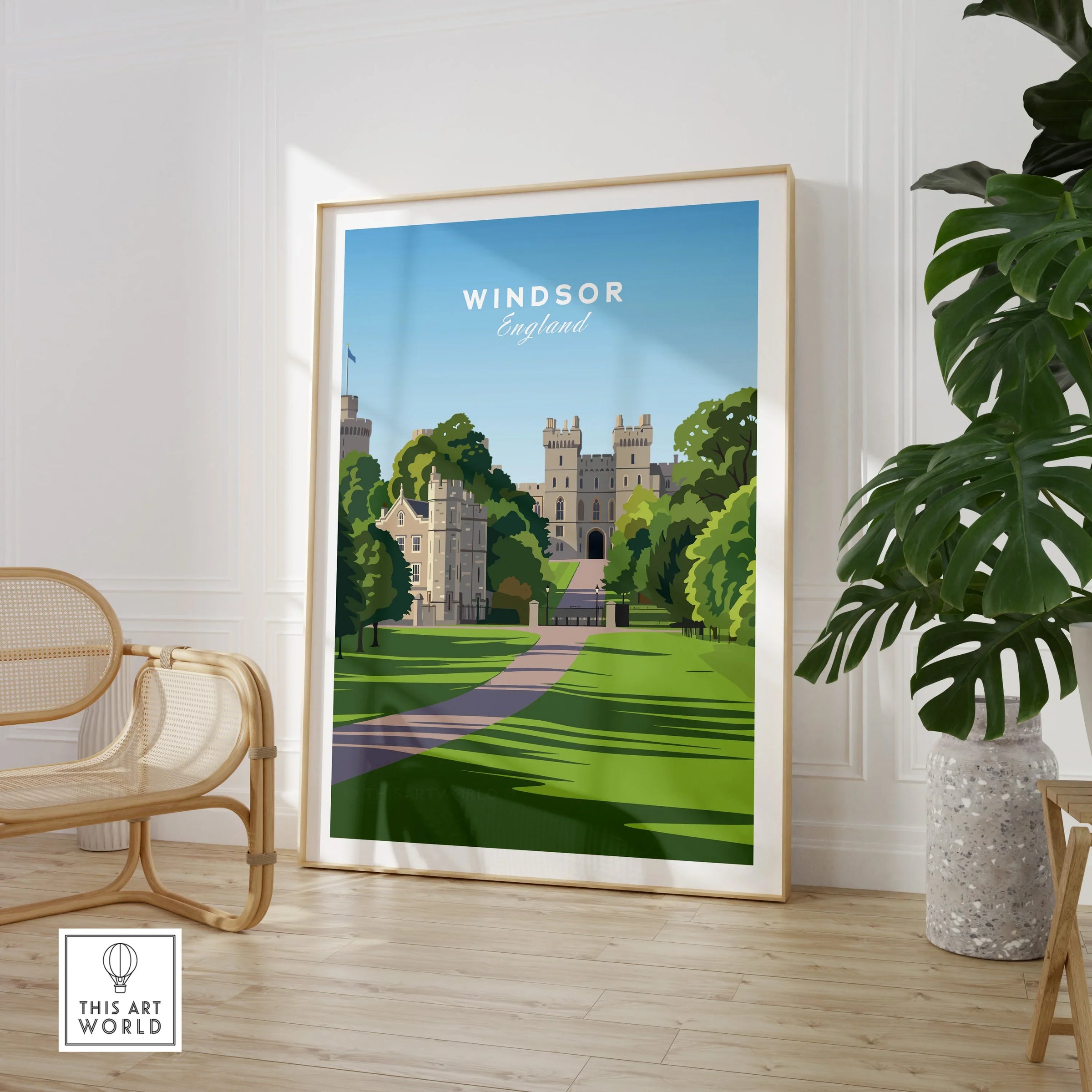 Framed Windsor England travel poster print in modern room with chair and plant