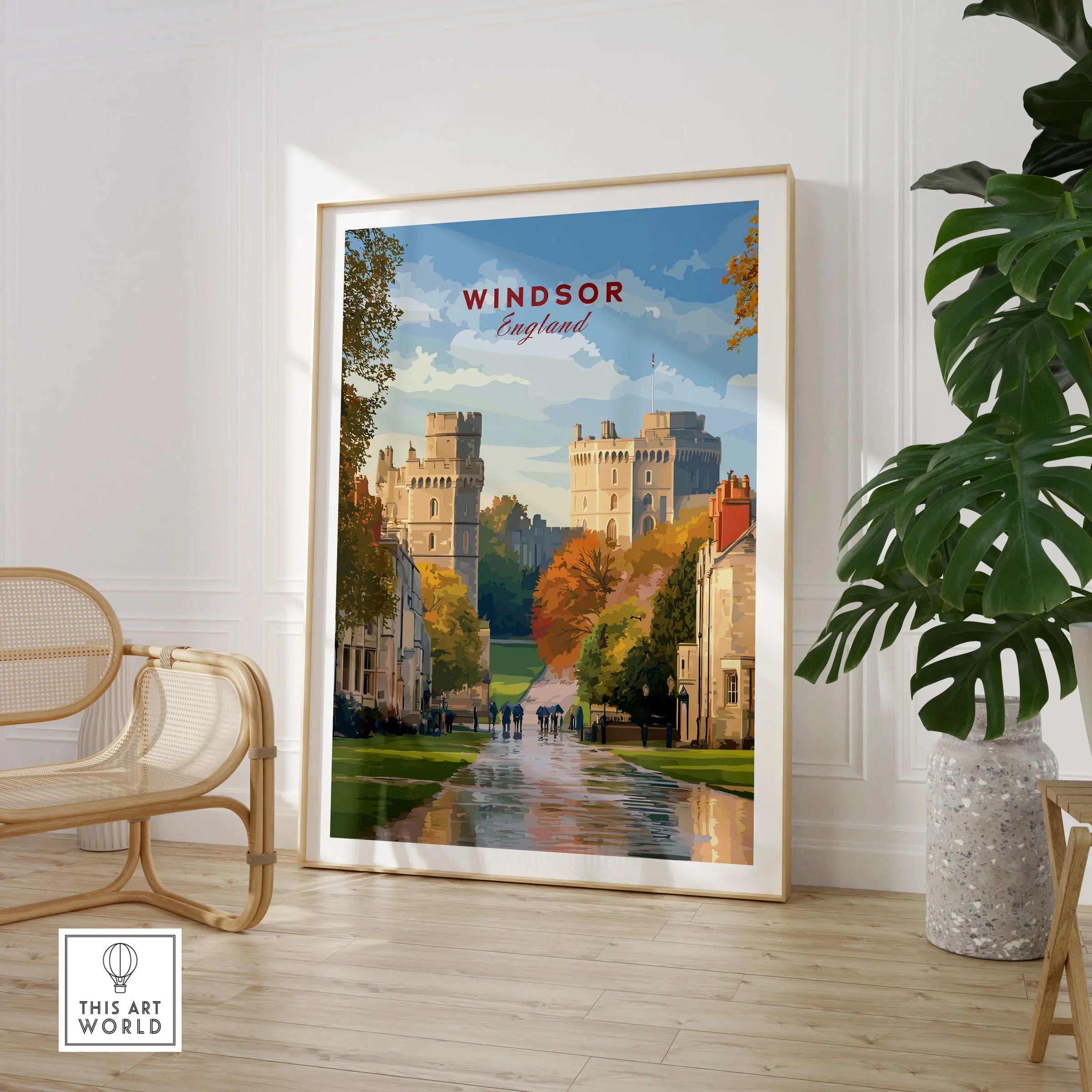Framed Windsor England travel poster in modern room with chair and leafy plant