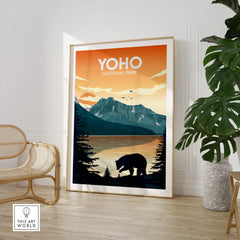 Framed Yoho National Park travel poster with bear and mountain art in modern room decor.