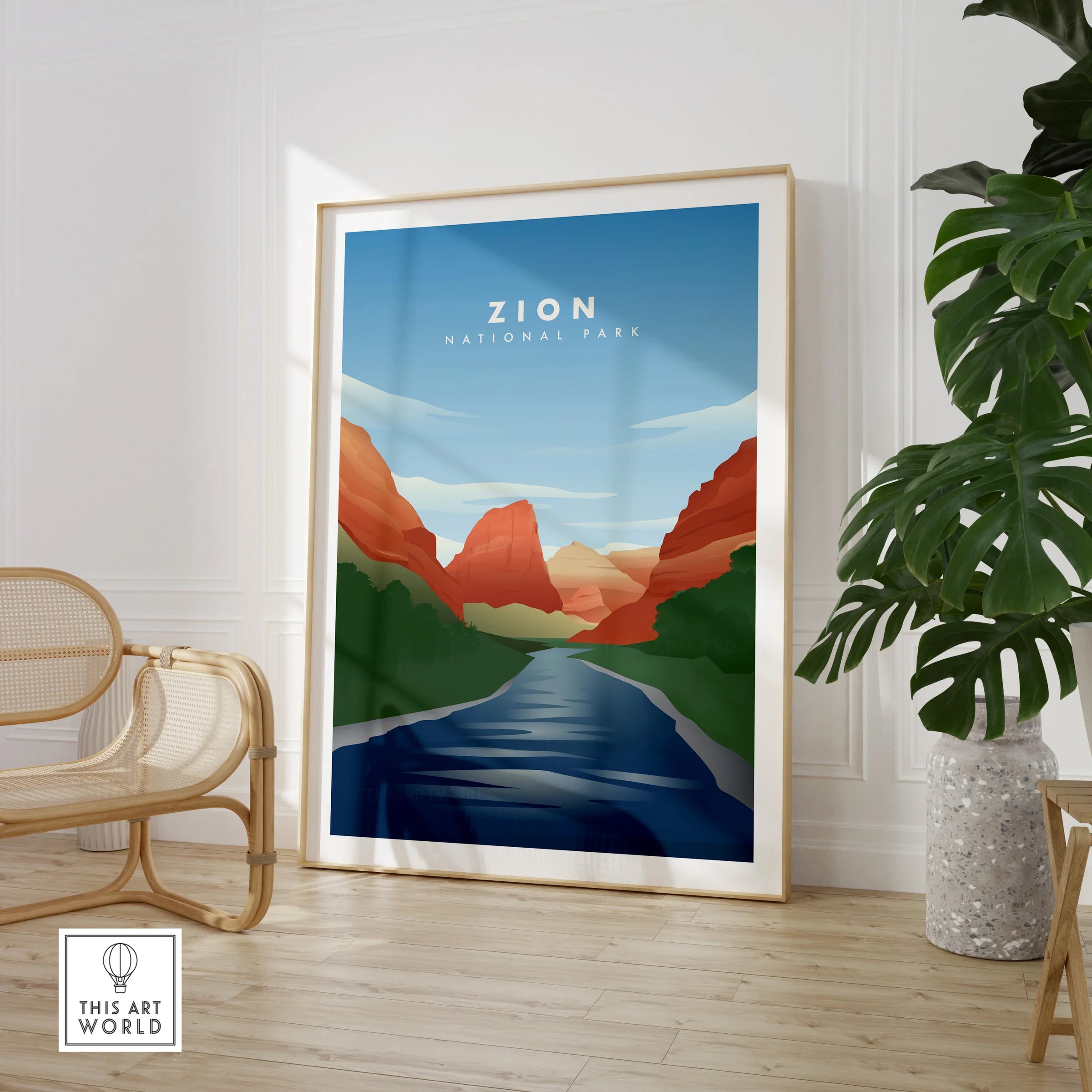 Zion National Park framed travel poster in modern room with chair and plant