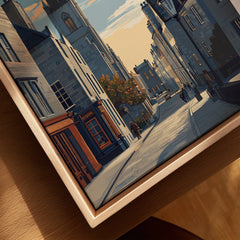 City skyline wall art print featuring historic streets, church spires, and autumn trees in wooden frame