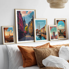 Framed travel posters of Paris, Aberdeen, Copenhagen, Tokyo, and Barcelona for wall art decor