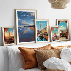 Framed travel posters of Paris, Aberdeen, Copenhagen, Tokyo, and Barcelona for home wall art decor