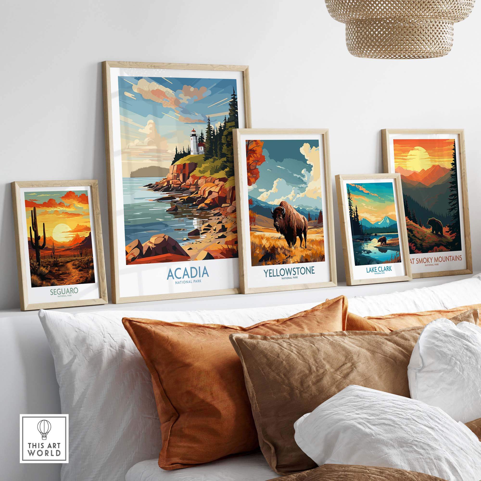 Acadia National Park Art Print displayed among other National Park prints on a wall, showcasing vibrant landscapes.