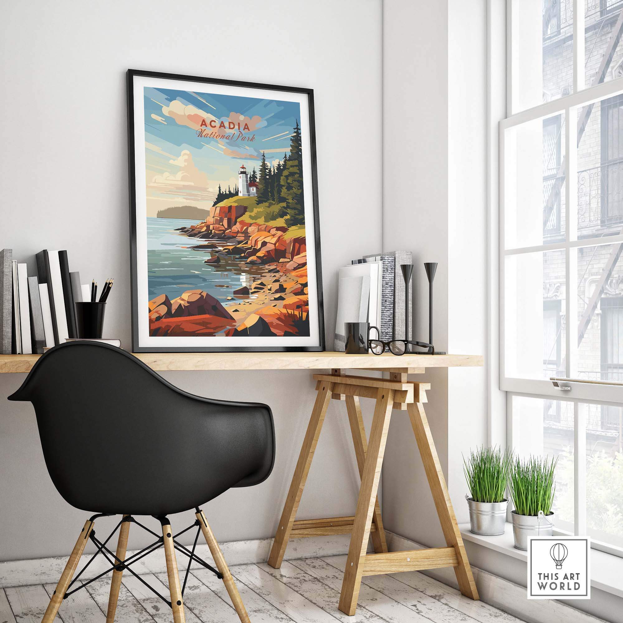 Acadia National Park Poster Print displayed on a wall above a modern desk in a cozy indoor workspace.