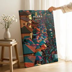Accra Ghana canvas print with mirror edge held by hand in a room setting