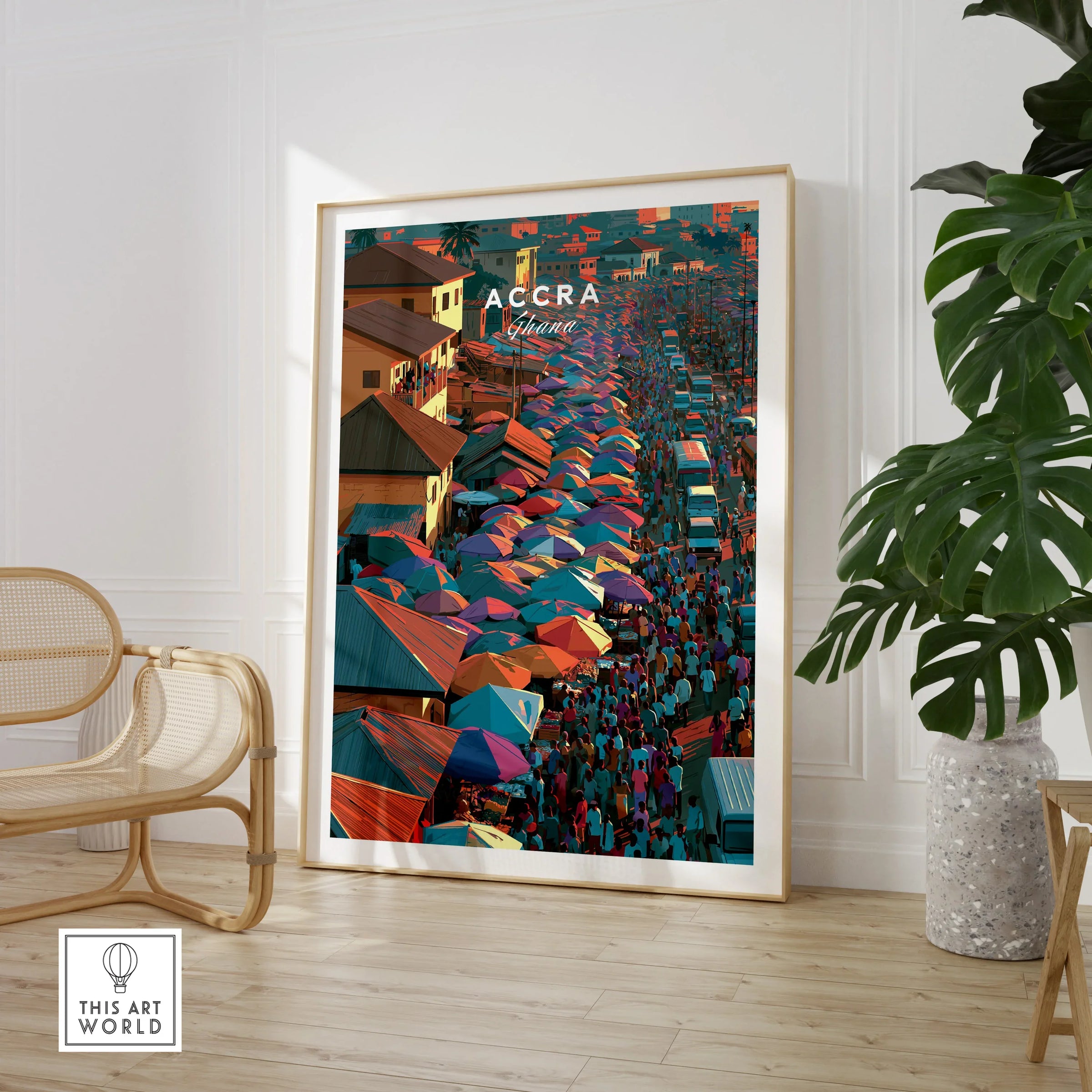 Large framed Accra Ghana travel poster in a room setting with chair and plant