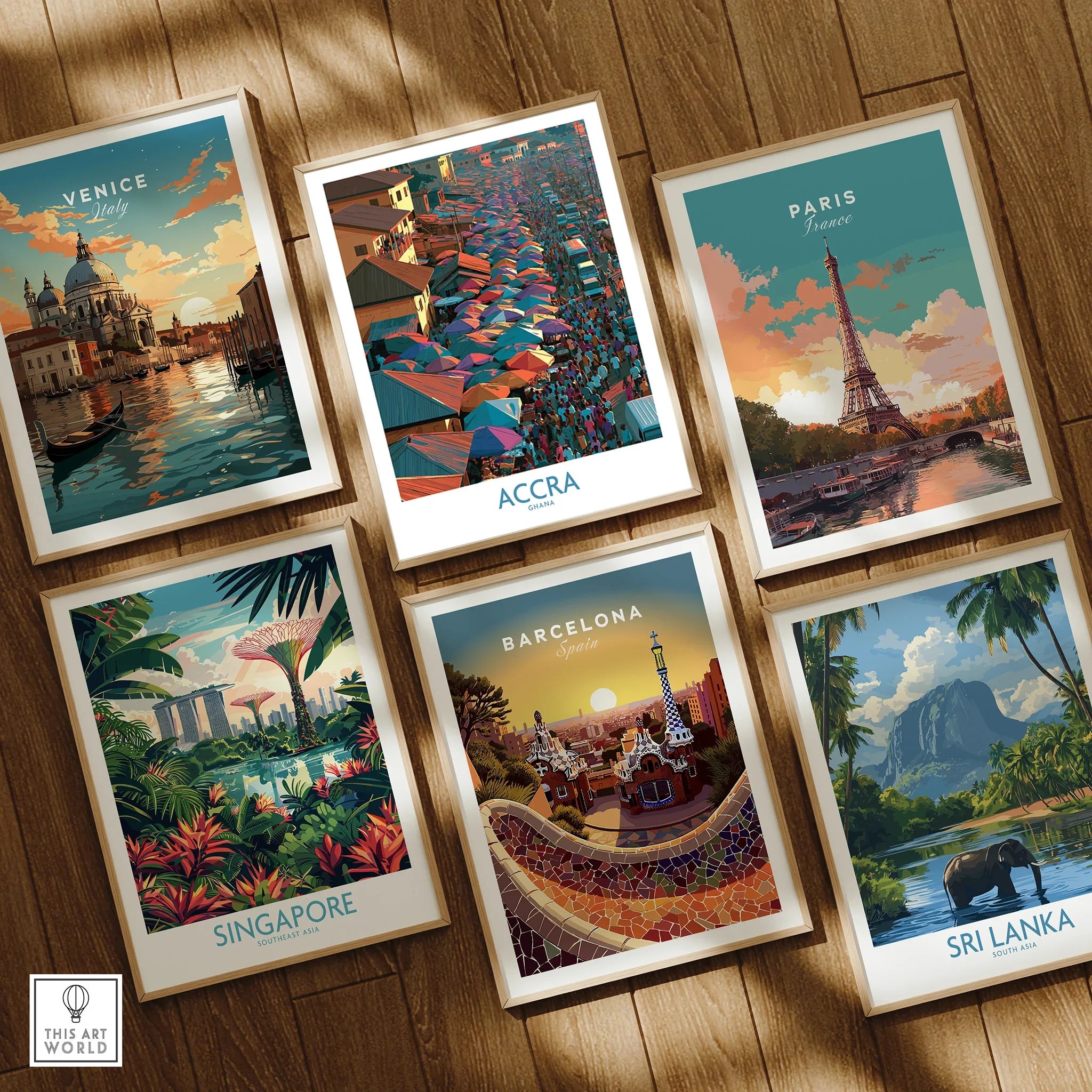 Set of six framed travel art prints including Accra Ghana on a wooden floor in natural wood frames