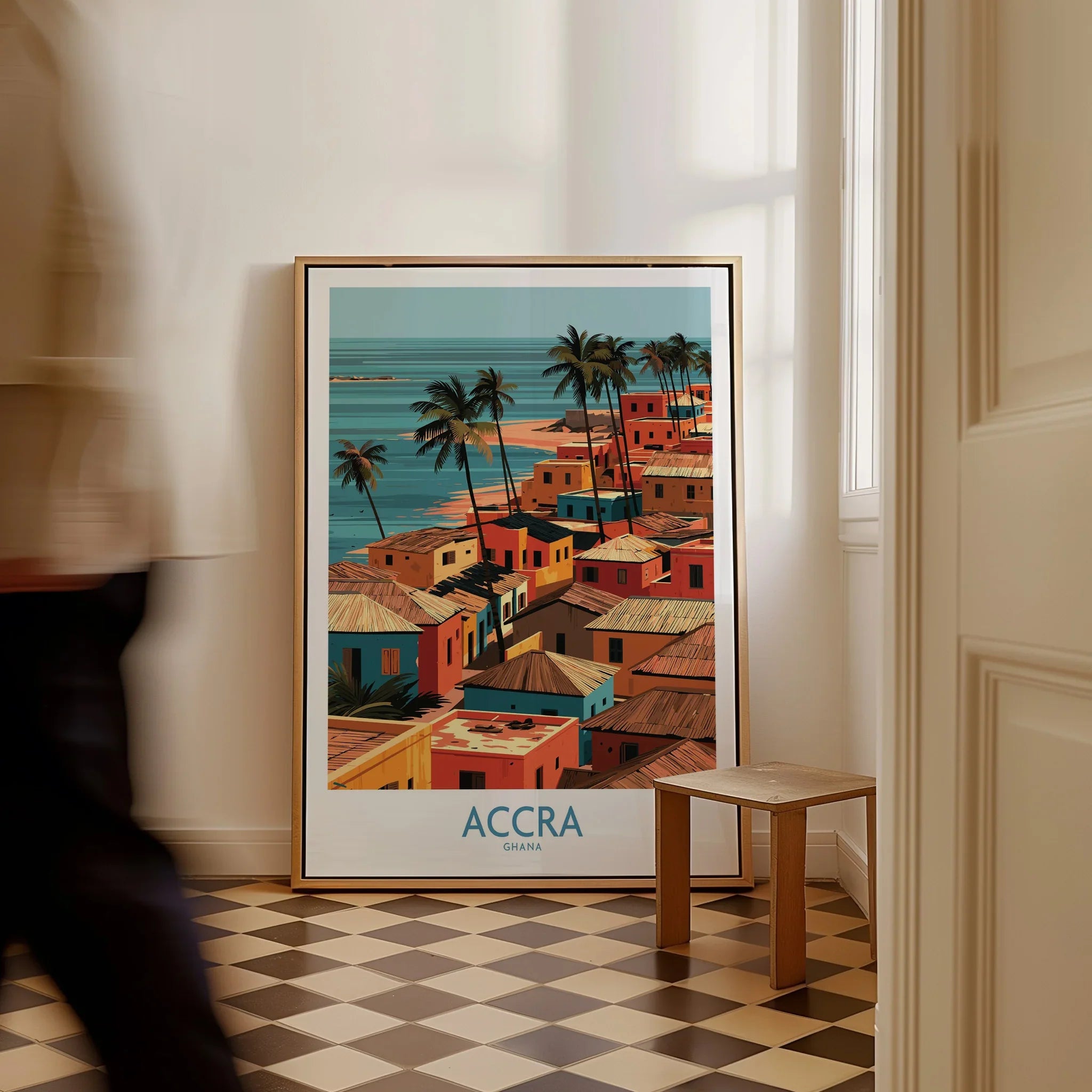 Accra Ghana Seaside Rooftops Wall Art — framed canvas on floor man walking past