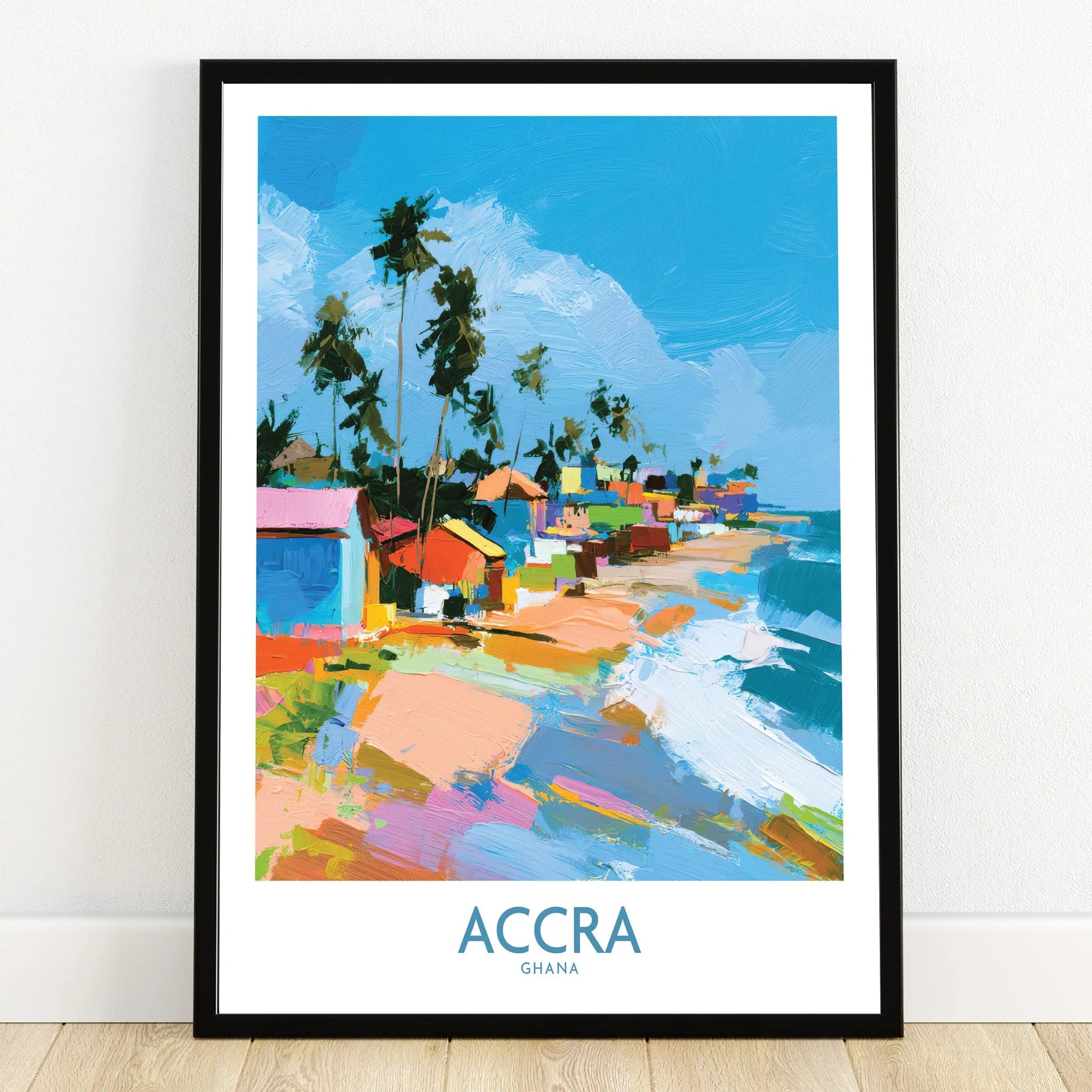 Accra Ghana Coastal Cabanas Wall Art — art print in black frame on wooden floor