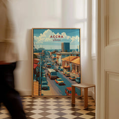 Accra Ghana City Avenue Travel Poster — framed canvas on floor man walking past