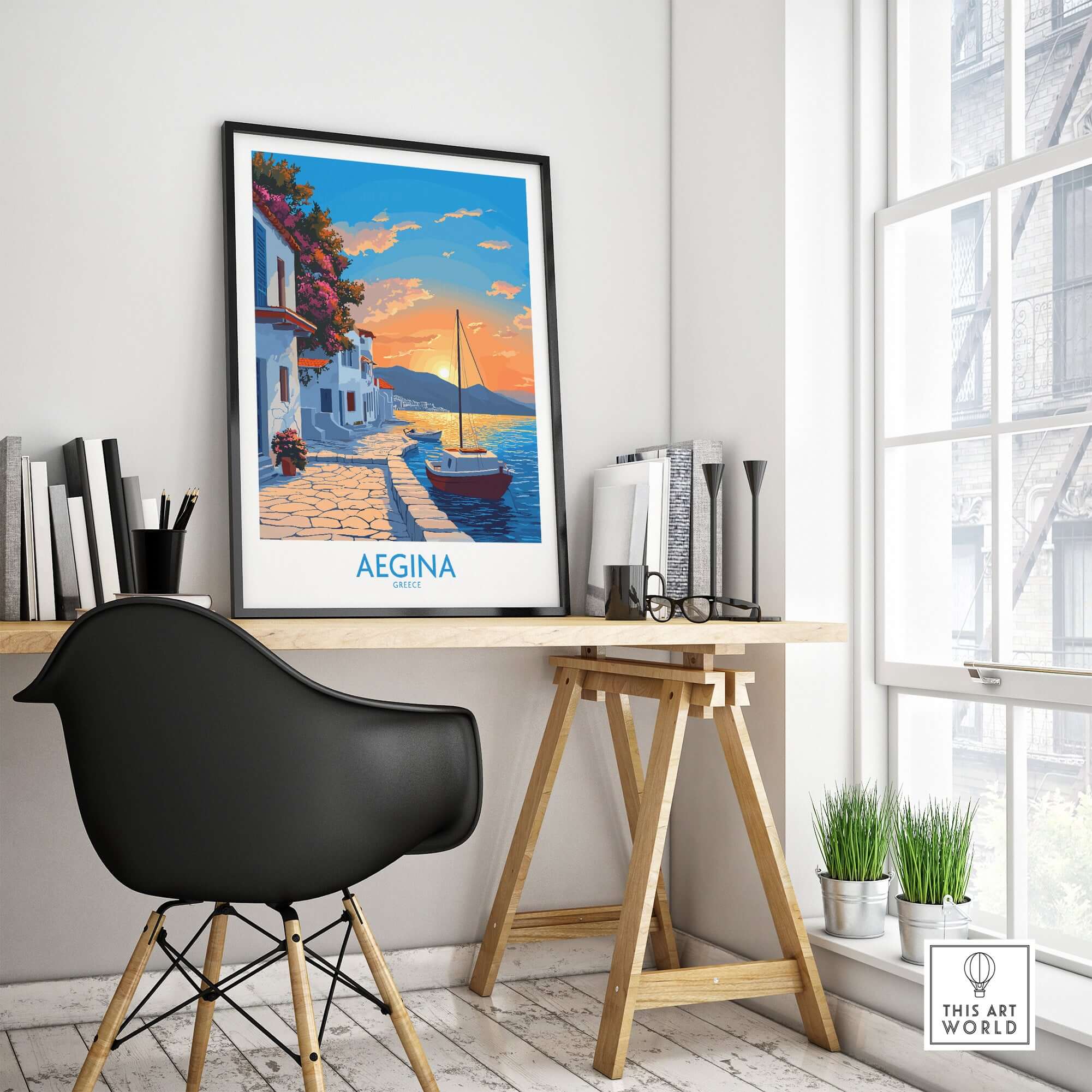 Aegina Greece Travel Poster displayed in a modern workspace, featuring a beautiful sunset and picturesque scenery.