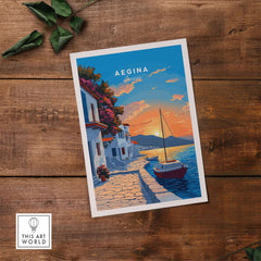 Aegina Greece Travel Print showcasing a colorful sunset by the sea with a boat on a picturesque Greek island.