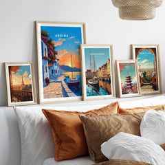 Aegina Greece Travel Print framed artwork displayed in a cozy living room setting with vibrant sunset colors.