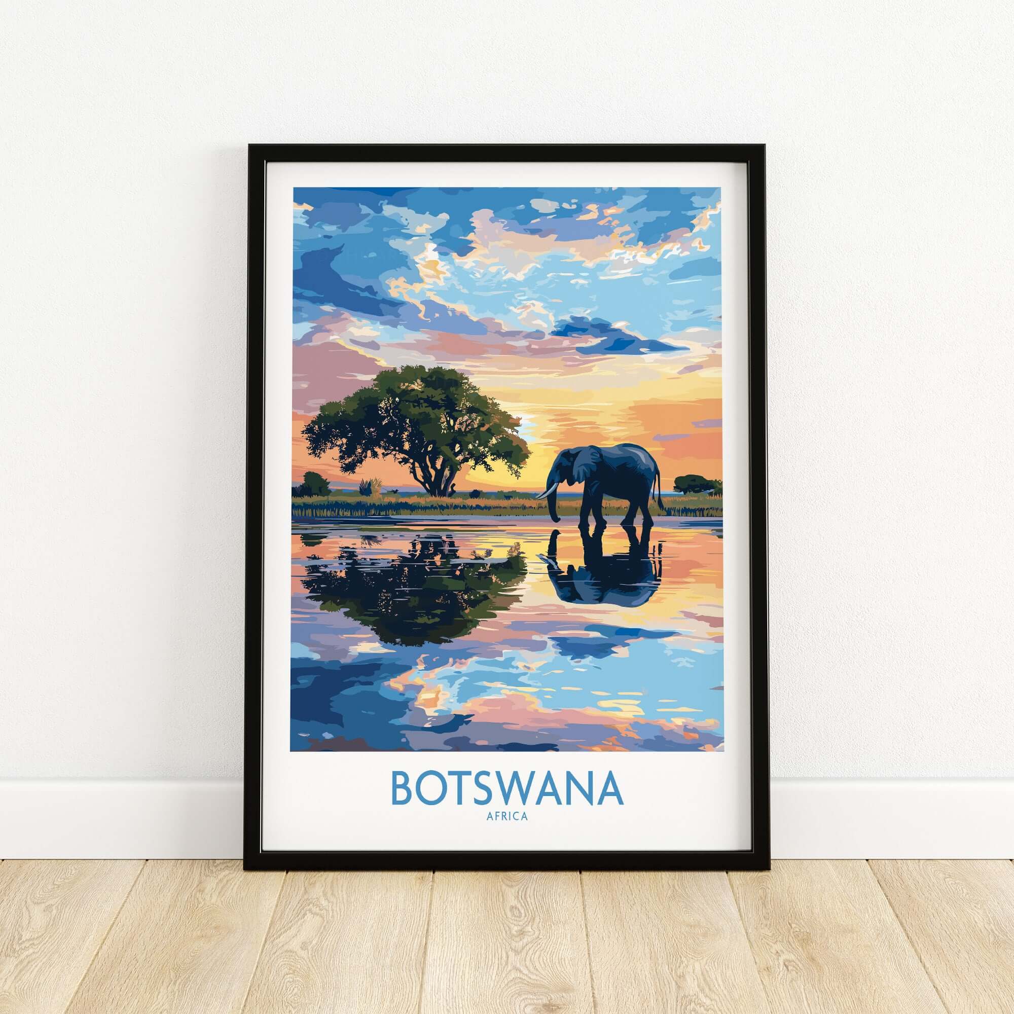 African Elephant in Botswana - Golden Hour Sunset Fine Art Print showcasing vibrant colors and reflections in the water.