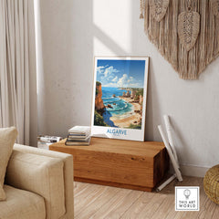 Algarve poster featuring a coastal view, displayed in a modern living room setting for vibrant home decor.