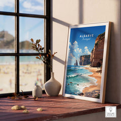 Algarve Beach poster in a sunlit room, showcasing ocean waves and cliffs, perfect for coastal home decor.