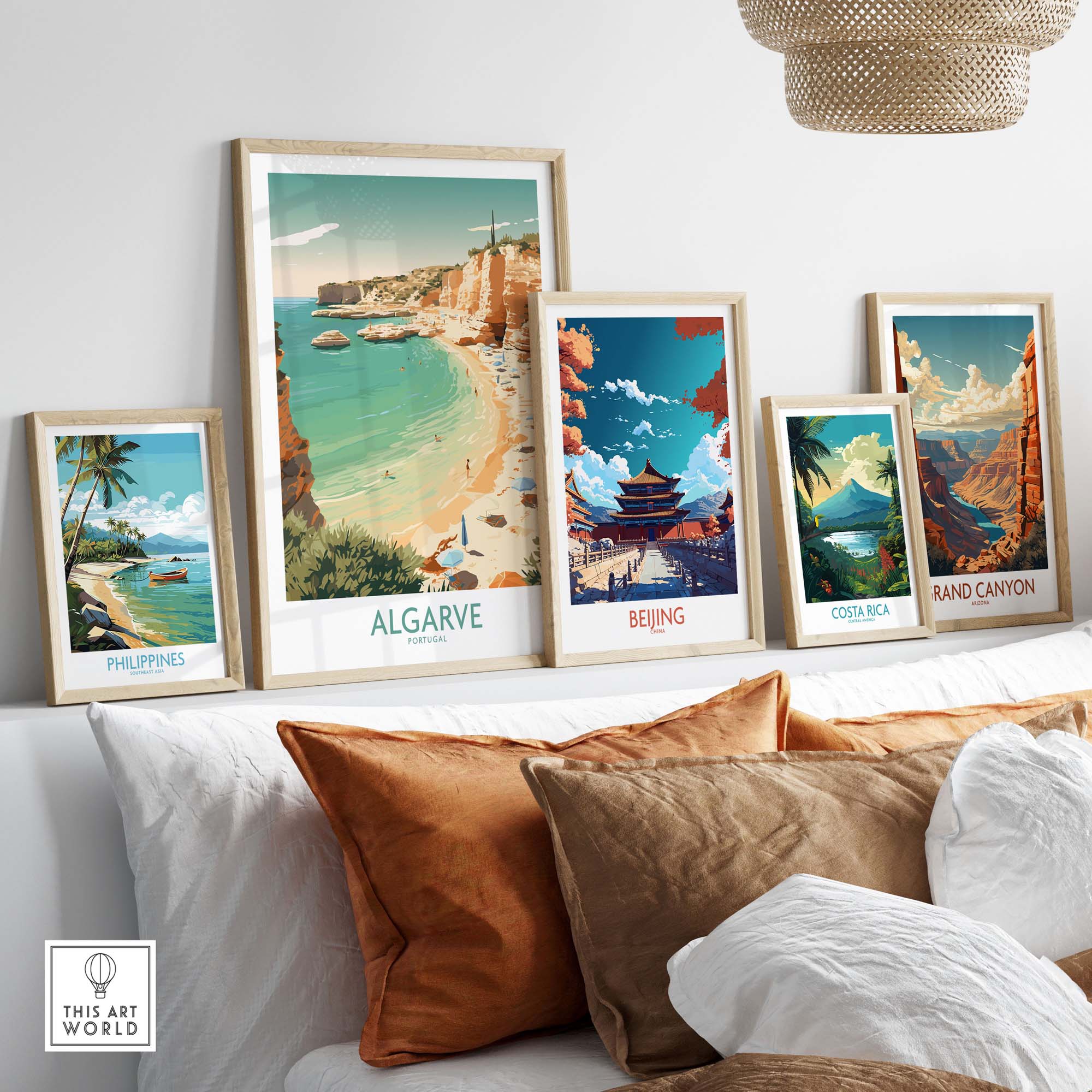 Modern Algarve wall art and travel posters featuring beach scenes and landscapes in a stylish home decor setting.
