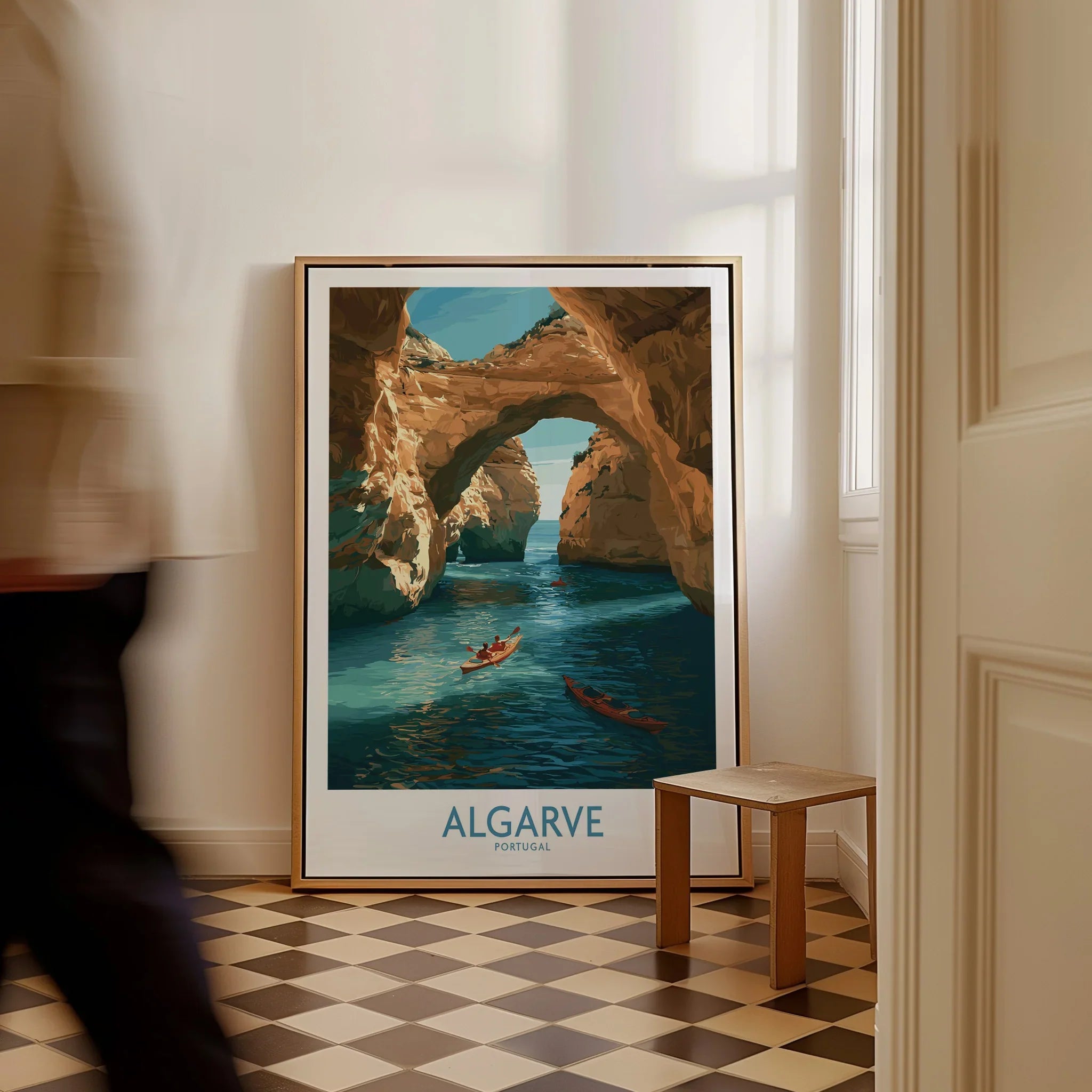 Algarve Portugal Cliffs Wall Art — framed canvas on floor man walking past