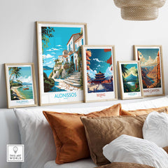Collection of vibrant travel posters including Alonissos Greece, displayed in a modern home decor setting.