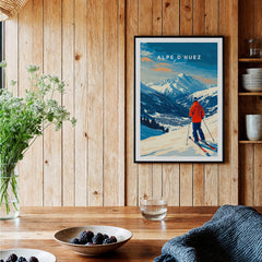 Alpe d'Huez Wall Art Ski Print featuring a skier on the slopes with stunning mountain views.
